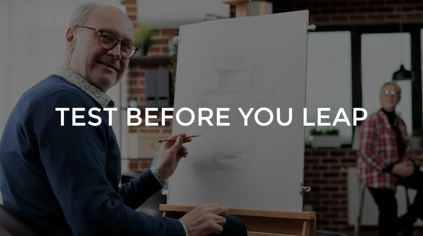 An older man learning to sketch at an easel
