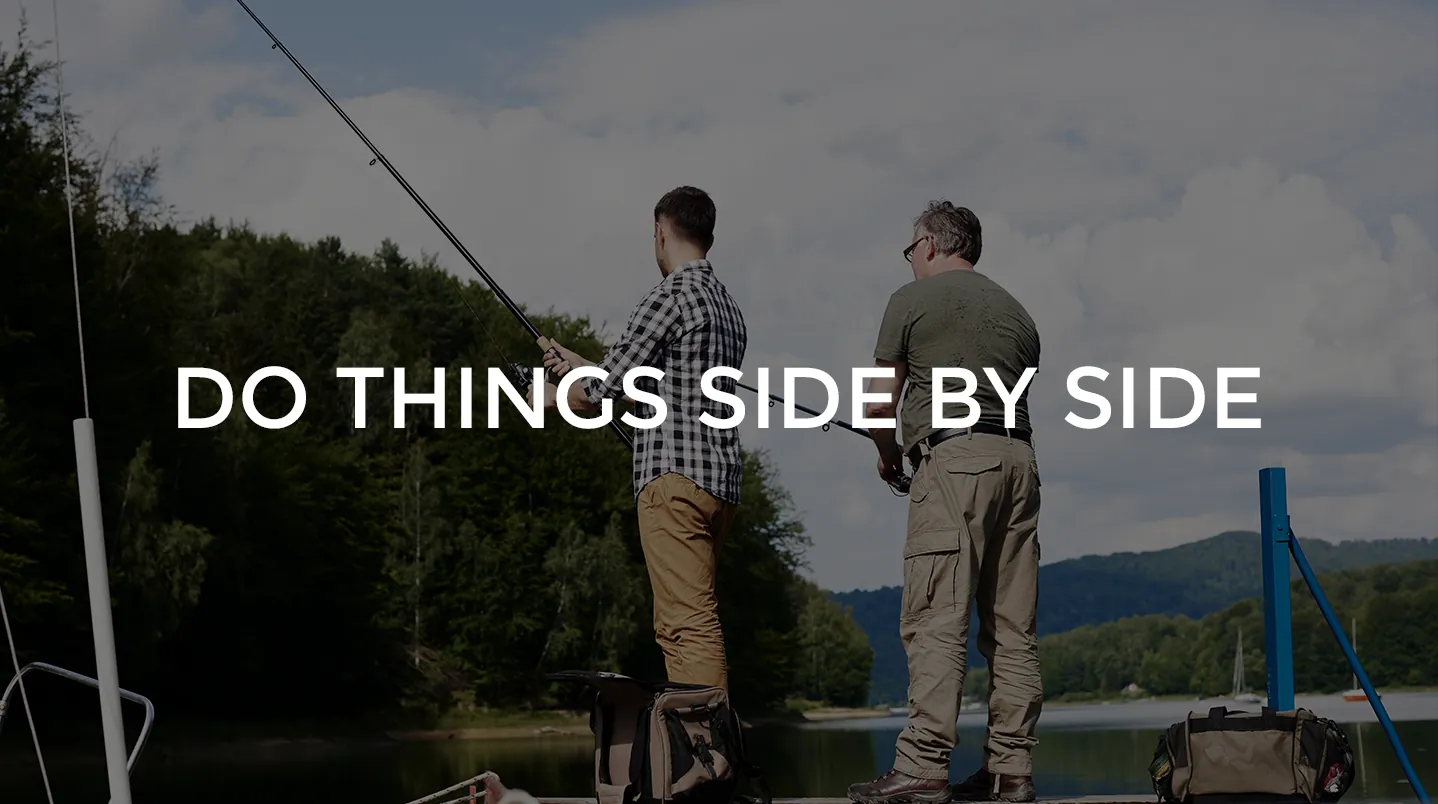 Two men fishing from a dock